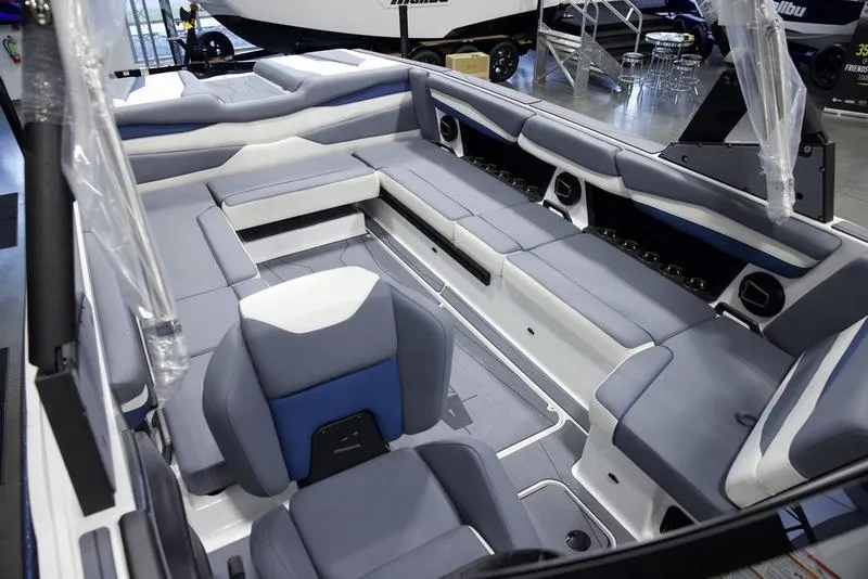 Slide: The Image of 2025 Axis A245 boat interior with spacious seating and modern design. - 18