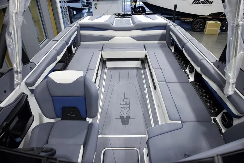 Slide: The Image of 2025 Axis A245 boat interior with spacious seating and modern design. - 19