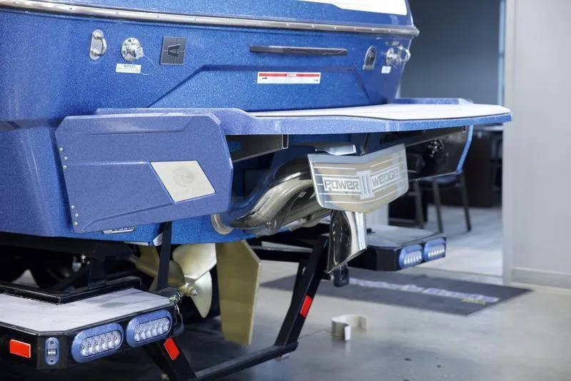 Slide: The Image of Axis A245 2025 boat rear view with advanced propulsion system and LED lights. - 5