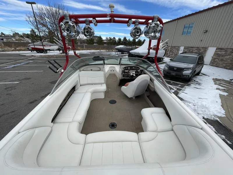 Slide: The Image of 2001 MasterCraft X30 boat with white interior and red wakeboard tower. - 11