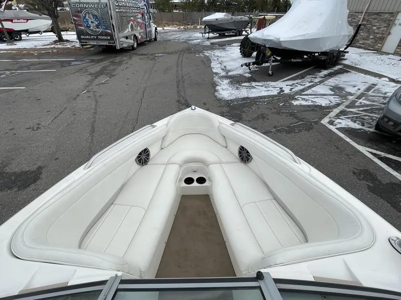 Slide: The Image of 2001 MasterCraft X30 boat with white interior, parked in snowy lot. - 18