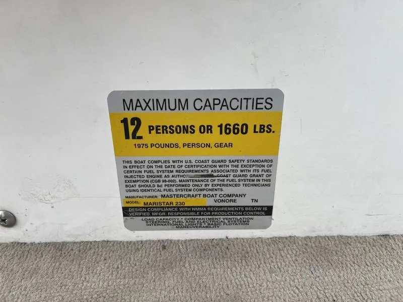 Slide: The Image of Capacity label on 2001 MasterCraft X30 boat: 12 persons or 1660 lbs. - 21