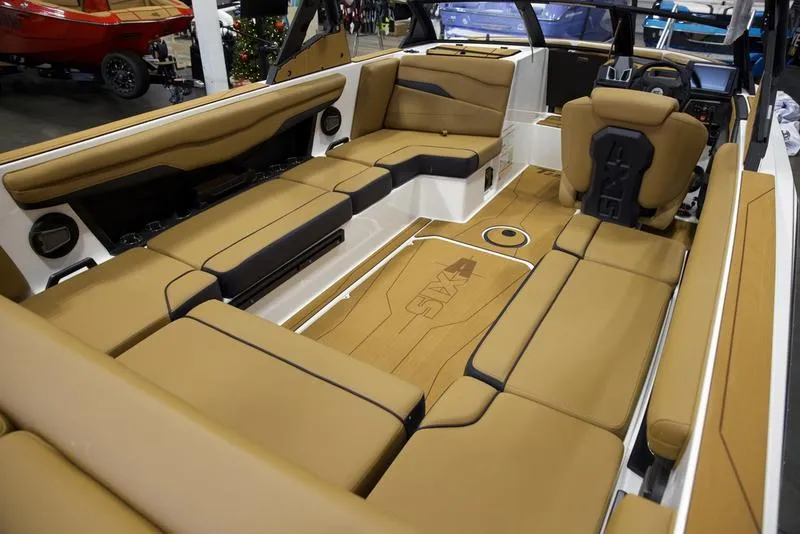 Slide: The Image of Luxurious interior of 2025 Axis T235 boat with tan seating and modern design. - 16
