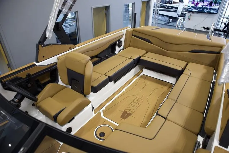 Slide: The Image of Luxurious interior of 2025 Axis T235 boat with tan leather seating. - 20