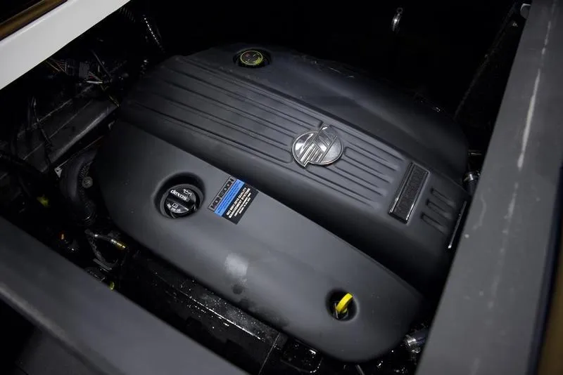 Slide: The Image of 2025 Axis T235 engine compartment, showcasing sleek black engine design. - 3