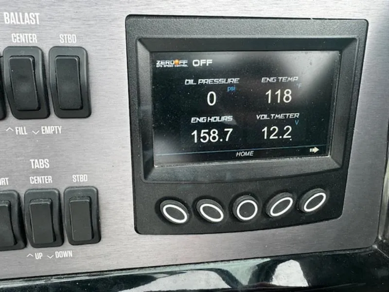 Slide: The Image of MasterCraft NXT22 2021 dashboard display showing engine metrics and ballast controls. - 8