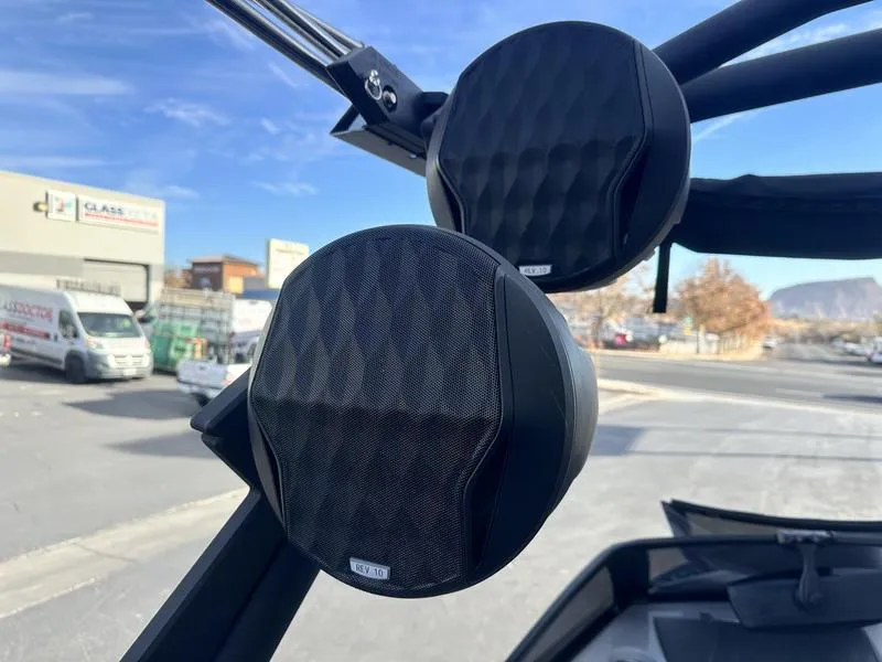 Slide: The Image of Close-up of speakers on a 2023 Malibu 23 LSV boat. - 18