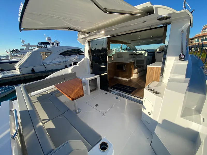Slide: The Image of 2025 Cruisers Yachts 46 Cantius with spacious deck and modern interior design. - 18