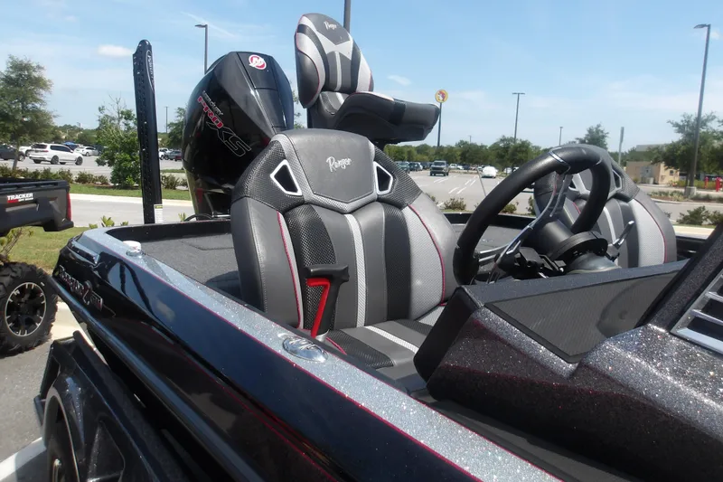 Slide: The Image of 2025 Ranger Z520R Cup-Equipped boat with sleek seating and modern steering wheel. - 12