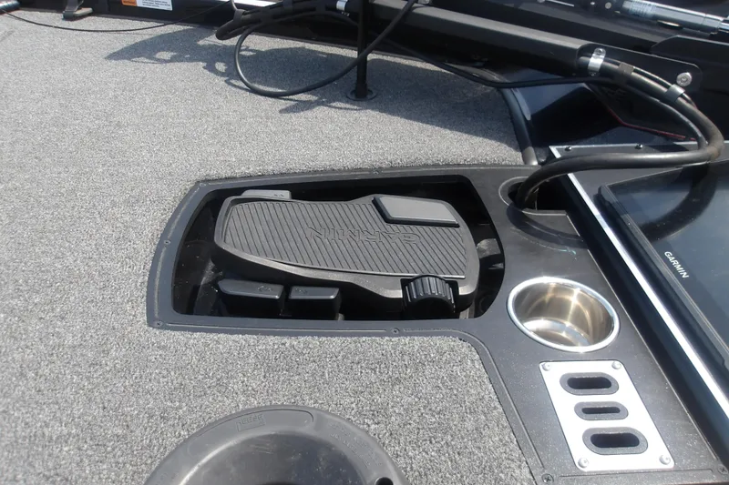 Slide: The Image of 2025 Ranger Z520R Cup-Equipped boat deck with pedal and cup holder. - 10