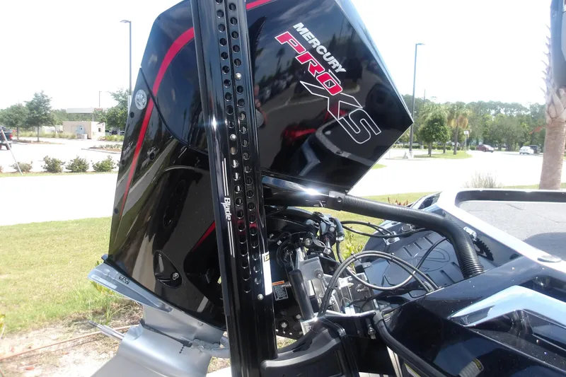Slide: The Image of 2025 Ranger Z520R Cup-Equipped boat with Mercury Pro XS engine, parked outdoors. - 14