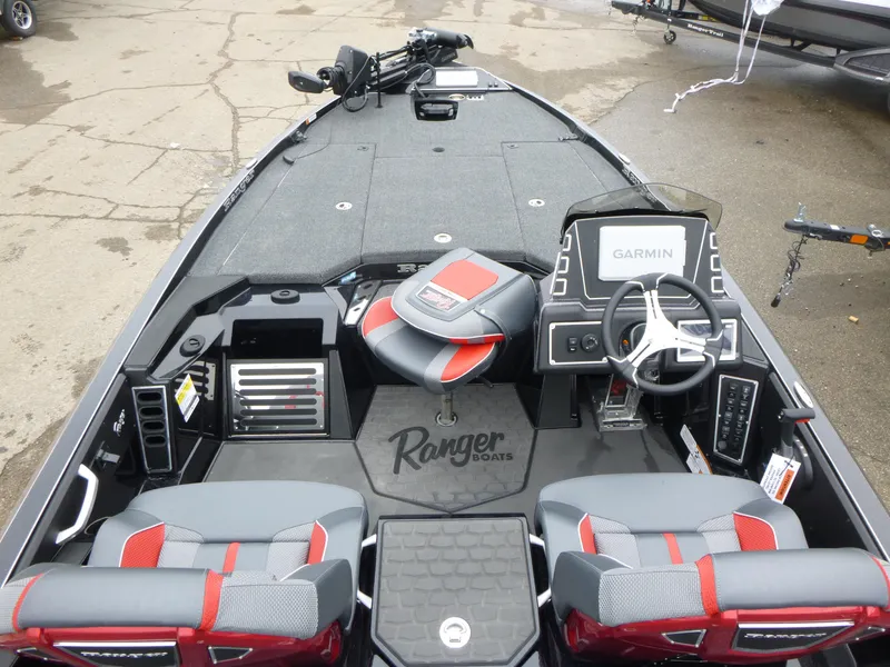 Slide: The Image of 2025 Ranger Z519R Cup-Equipped boat interior with Garmin system and stylish seating. - 12