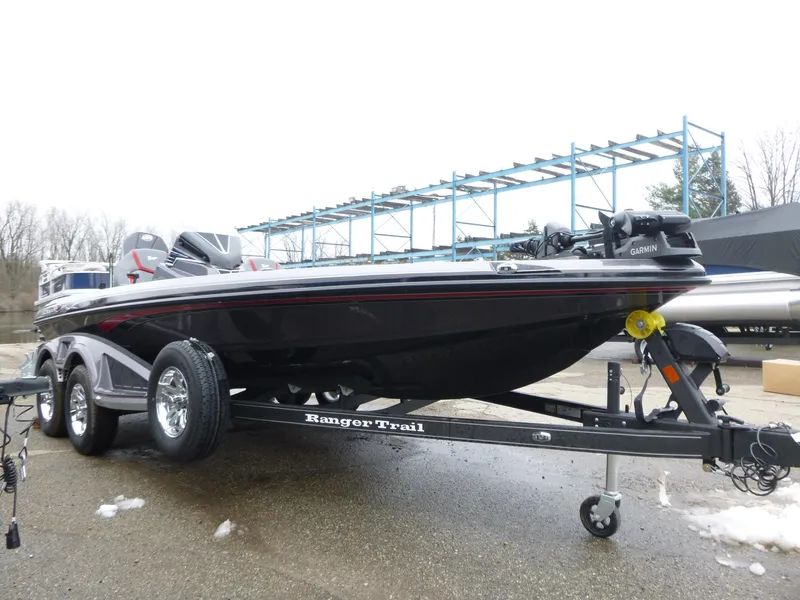 Slide: The Image of 2025 Ranger Z519R Cup-Equipped boat on trailer, parked outdoors. - 5