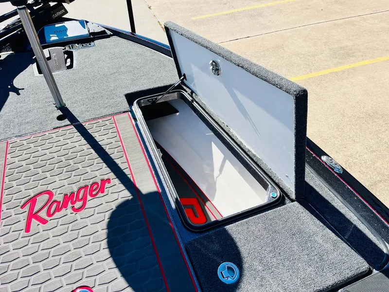 Slide: The Image of 2025 Ranger Z520R Cup-Equipped boat with open storage compartment on deck. - 21