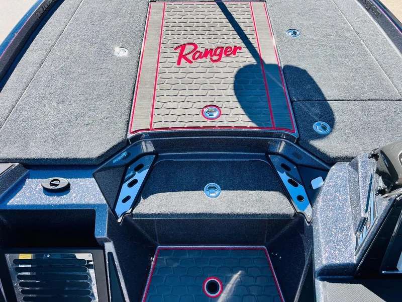 Slide: The Image of 2025 Ranger Z520R Cup-Equipped boat deck with logo and textured surface. - 25