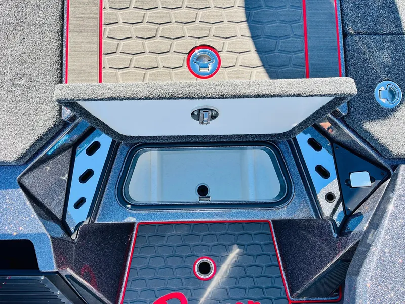 Slide: The Image of 2025 Ranger Z520R Cup-Equipped boat interior with storage compartment and sleek design. - 27