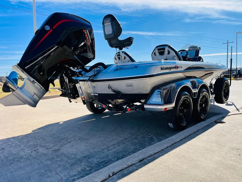 Slide: The Image of 2025 Ranger Z520R Cup-Equipped boat with powerful outboard motor on a sunny day. - 4