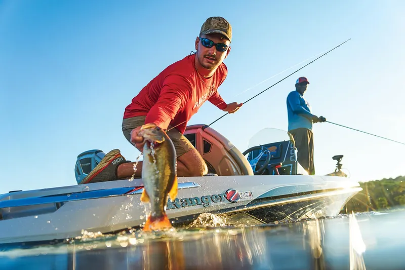 Slide: The Image of 2025 Ranger Z519R Cup-Equipped boat interior with advanced navigation systems and comfortable seating. - 93