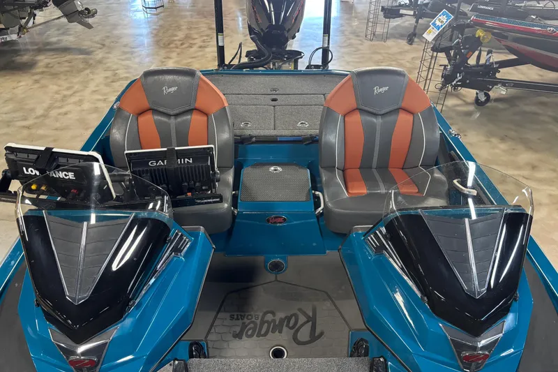 Slide: The Image of 2025 Ranger Z519R Cup-Equipped boat interior with dual seats and navigation systems. - 95