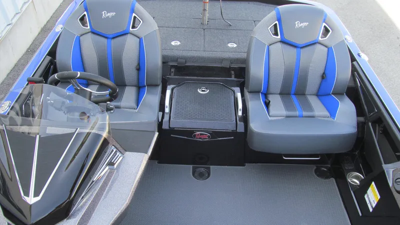 Slide: The Image of 2025 Ranger Z520R Cup-Equipped boat interior with dual seats and steering console. - 12
