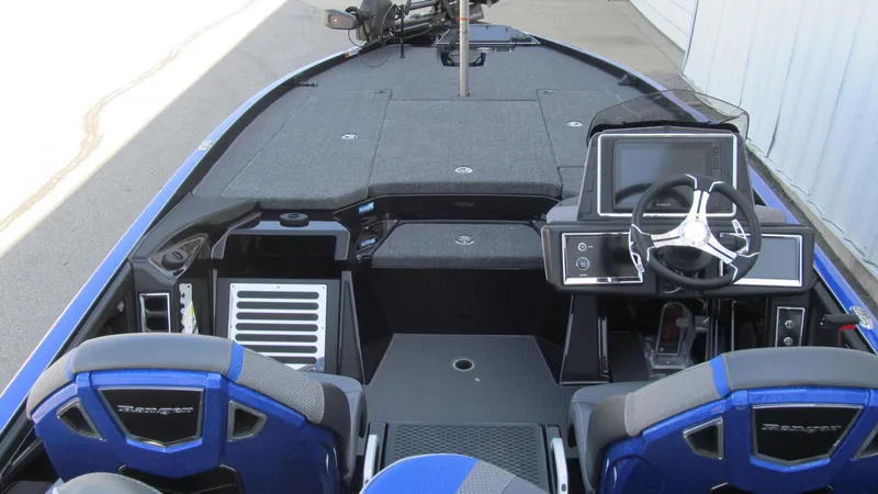 Slide: The Image of 2025 Ranger Z520R Cup-Equipped boat interior with advanced dashboard and seating. - 5