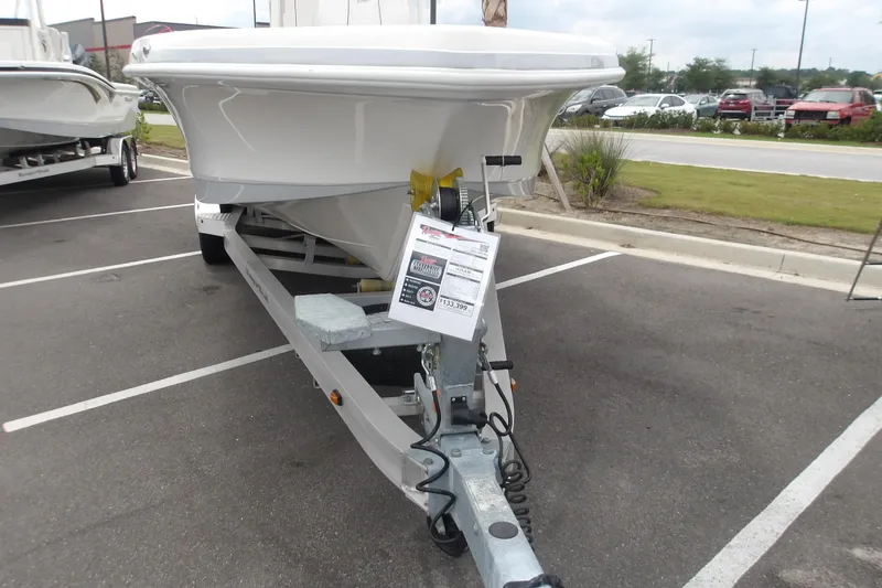 The Image of 2025 Ranger 2600 Bay boat on trailer in parking lot, front view. - 0