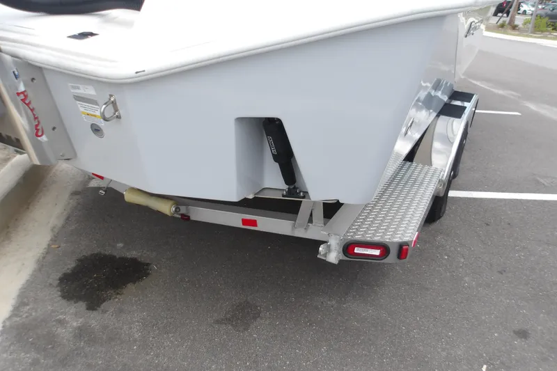 Slide: The Image of 2025 Ranger 2600 Bay boat on trailer, rear view in parking lot. - 7