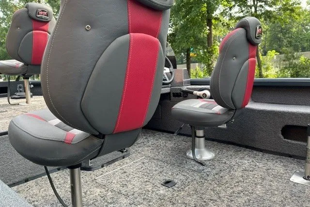Slide: The Image of 2025 Ranger VS1782SC Angler boat interior with red and gray seating. - 10