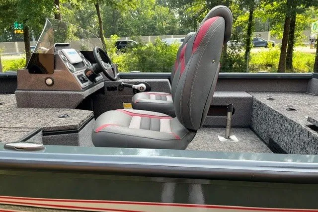 Slide: The Image of 2025 Ranger VS1782SC Angler boat interior with steering console and seating. - 7
