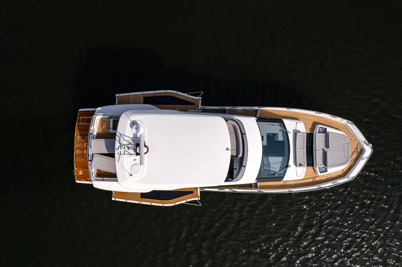 Slide: The Image of Aerial view of 2025 Galeon 560 Fly yacht on water. - 4
