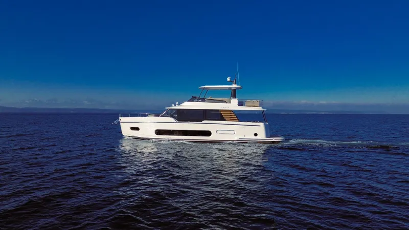 Slide: The Image of Azimut Magellano 60 yacht cruising on open sea, 2025 model. - 3