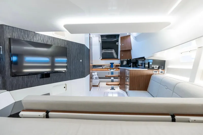 Slide: The Image of Luxurious interior of 2023 Sea Ray Sundancer 370 OB with modern amenities and sleek design. - 28