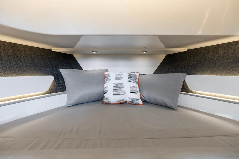 Slide: The Image of Luxurious cabin interior of 2023 Sea Ray Sundancer 370 OB with modern bedding. - 30