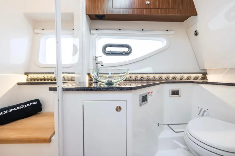 Slide: The Image of Luxurious bathroom interior of 2023 Sea Ray Sundancer 370 OB yacht. - 34
