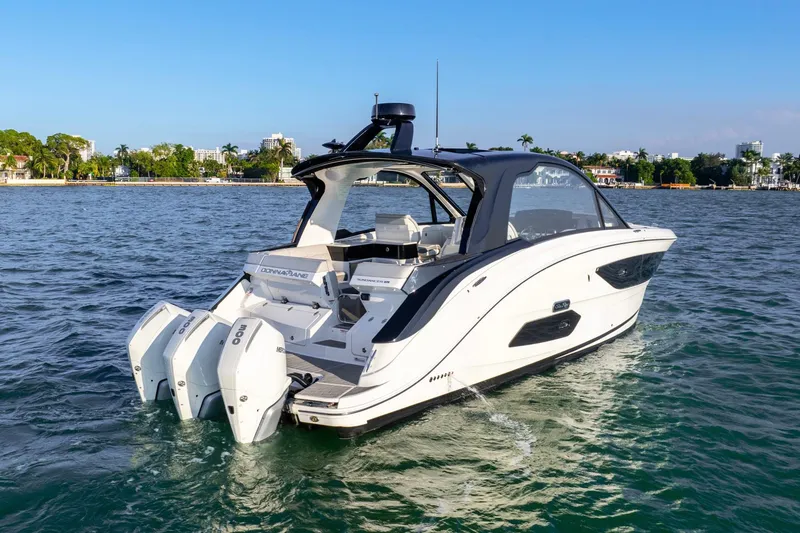 Slide: The Image of 2023 Sea Ray Sundancer 370 OB cruising on a sunny day. - 8