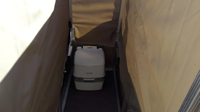 Slide: The Image of Portable toilet on 2020 Landau Atlantis 250 Cruise boat. - 18