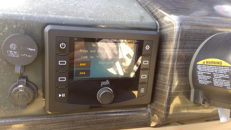 Slide: The Image of Dashboard of 2020 Landau Atlantis 250 Cruise with Polk audio system. - 22