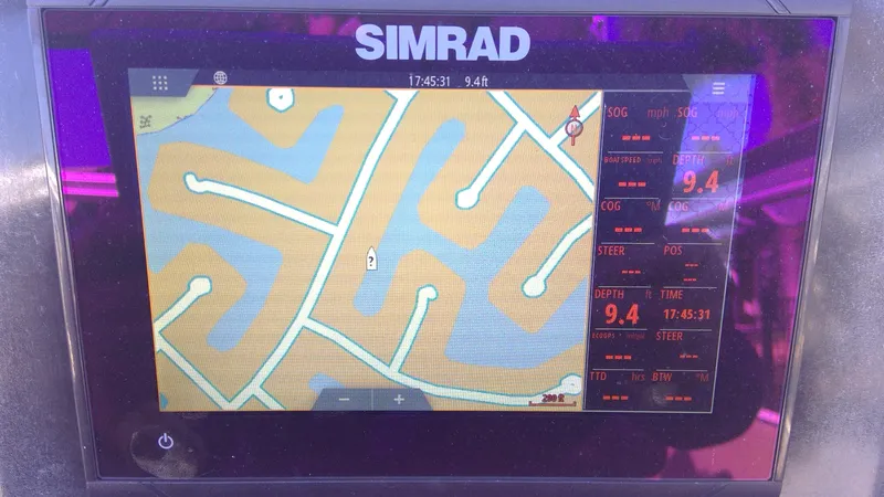 Slide: The Image of Simrad navigation display on 2020 Landau Atlantis 250 Cruise boat. - 23