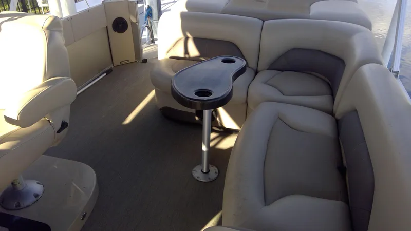 Slide: The Image of Interior of 2020 Landau Atlantis 250 Cruise boat with beige seating and table. - 30