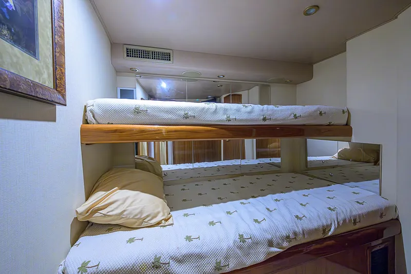 Slide: The Image of Bunk beds in 2007 Viking 68 Convertible yacht cabin interior. - 10
