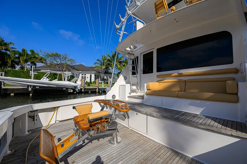 Slide: The Image of 2007 Viking 68 Convertible yacht with spacious deck and comfortable seating. - 27