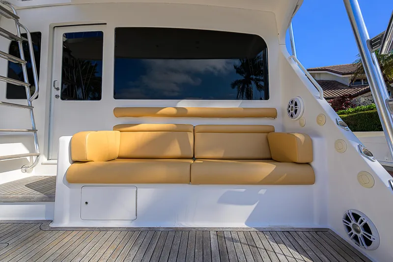 Slide: The Image of Viking 68 Convertible 2007 yacht with tan seating on deck. - 29
