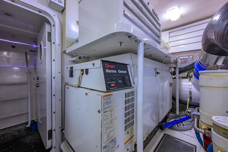 Slide: The Image of Engine room of 2007 Viking 68 Convertible with Onan marine generator. - 41