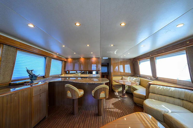 Slide: The Image of Luxurious interior of 2007 Viking 68 Convertible yacht with elegant seating and modern design. - 8