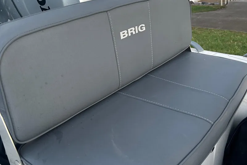 Slide: The Image of 2022 Brig Falcon Tender 300 boat seat with gray upholstery. - 22