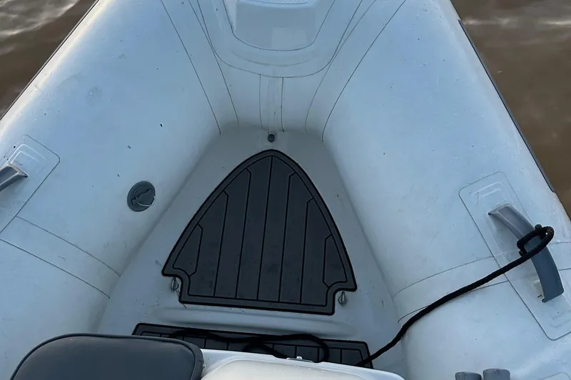 Slide: The Image of 2022 Brig Falcon Tender 300 inflatable boat interior, featuring a spacious seating area. - 23