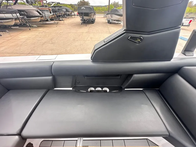 Slide: The Image of 2024 Aviara AV28 boat interior with sleek seating and modern design. - 16