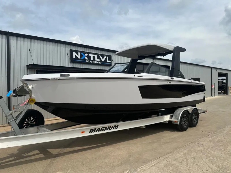 Slide: The Image of 2024 Aviara AV28 boat on trailer at NXT LVL Marine dealership. - 2
