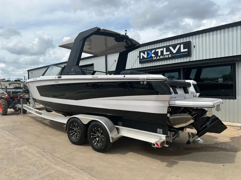 Slide: The Image of 2024 Aviara AV28 boat on trailer at NXT LVL Marine dealership. - 3