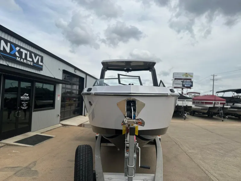 Slide: The Image of 2024 Aviara AV28 boat on trailer at NXT LVL Marine dealership. - 7
